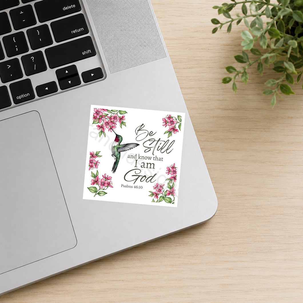Pink hummingbird with flowers Be Still waterproof sticker on laptop