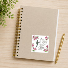 Pink hummingbird with flowers Be Still waterproof sticker on notebook